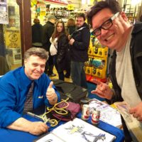 Comic legend Neal Adams came by for a signing on March 25, 2015. You can see staffer Sam is happy!